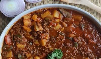 طريقة عمل صينية بطاطا بالبندورة